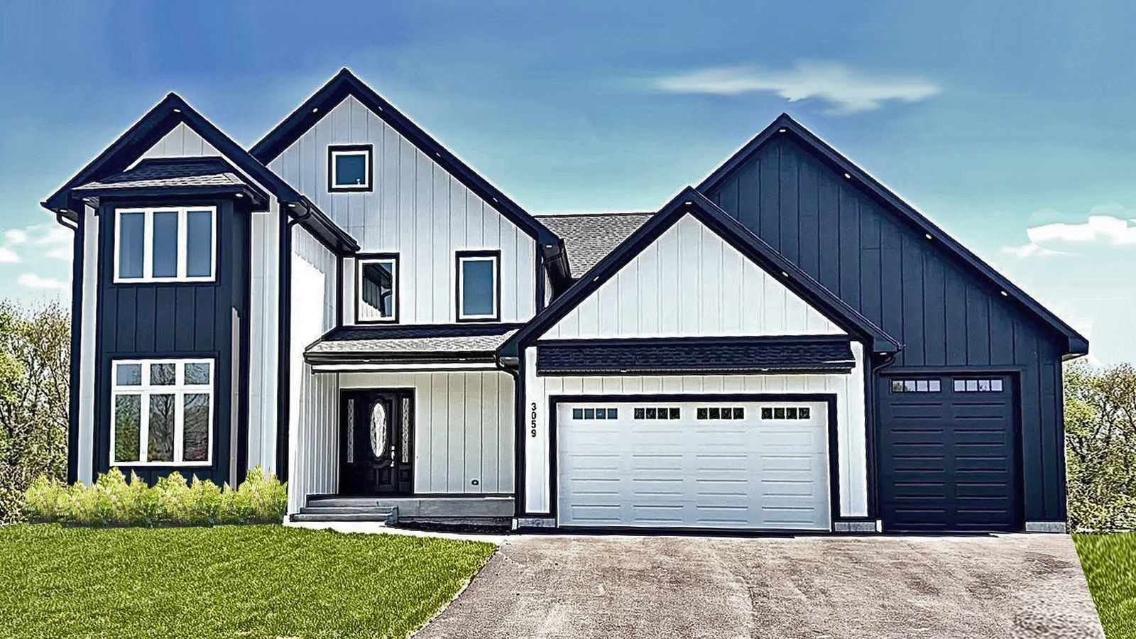 Modern two-story house with gray siding, black accents, and a two-car garage