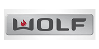 WOLF logo on a silver metallic badge with a red flame inside the letter W