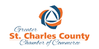 Logo for Greater St. Charles County Chamber of Commerce. Features an abstract design with orange, blue, and white text.